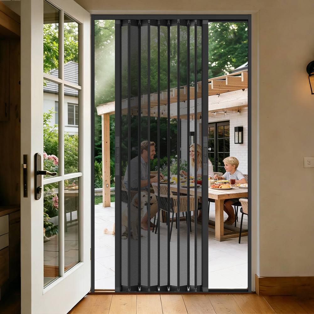 Double opening foldable security screen door installed on patio entrance with outdoor dining area