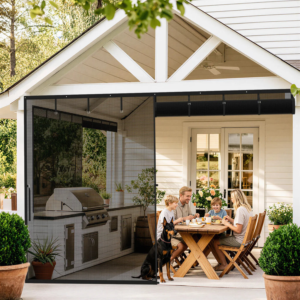 A family having lunch at a patio table behind a magnetic screen door with a roll-up feature.
